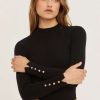 black long sleeve knit top